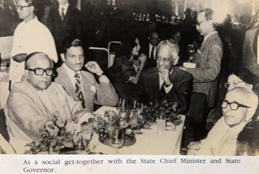 Ajay Rungta (Dadu) seated with the West Bengal Chief Minister and Governor at a social event. Vintage black and white photograph.