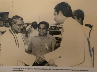 Monochrome photo: Ajay 'Dadu' Rungta greets Minister A.B. Vajpayee with a handshake at the BCC Platinum Jubilee.