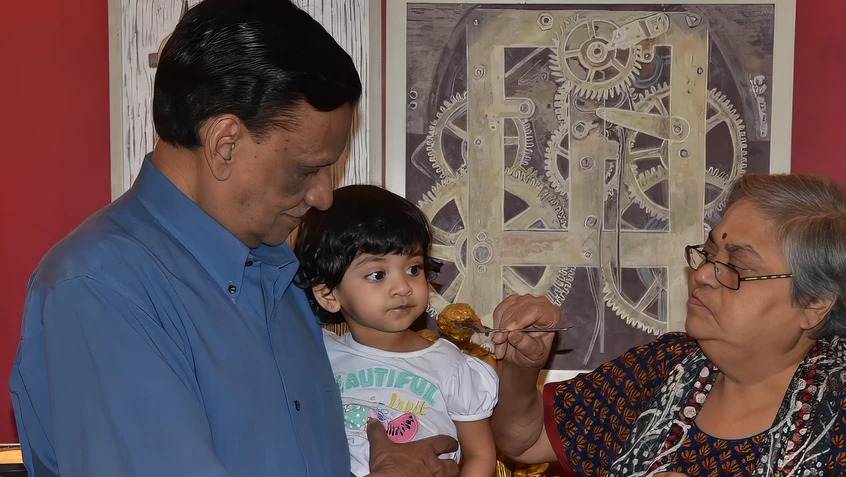 Dadu and Grandchild Feeding Time